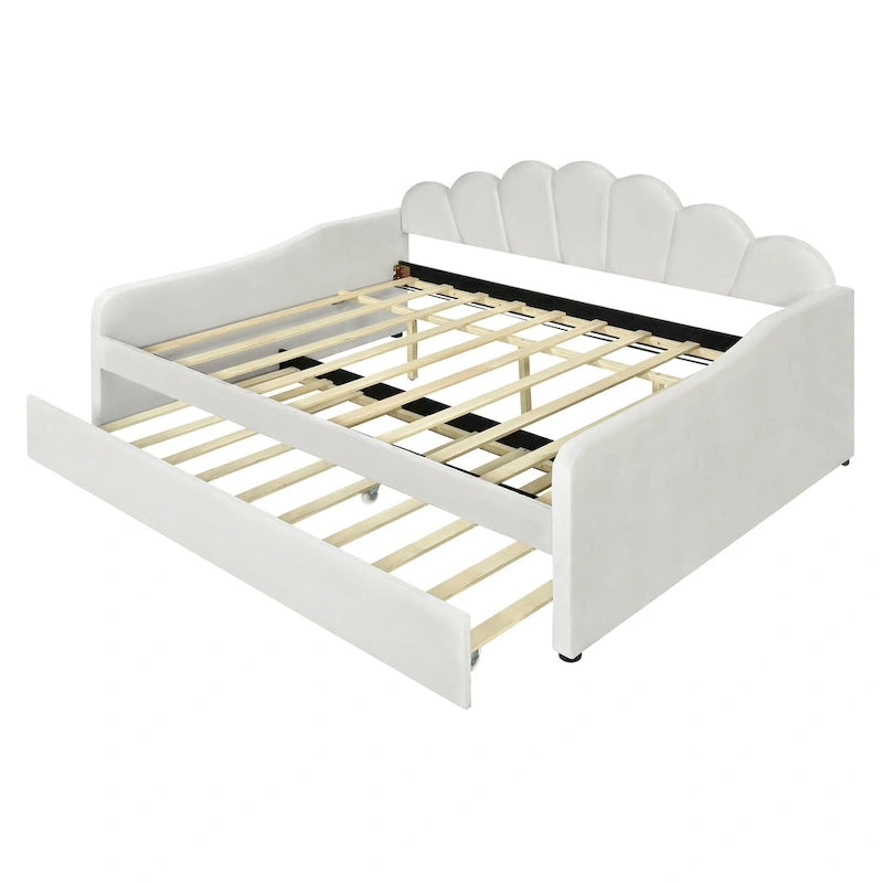 Lit de repos blanc entièrement rembourré avec dossier en forme de coquille et lit gigogne