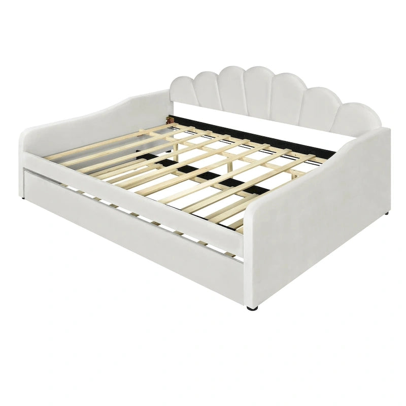 Lit de repos blanc entièrement rembourré avec dossier en forme de coquille et lit gigogne