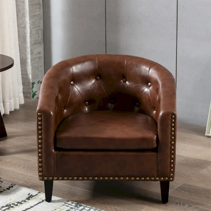 Fauteuil de club contemporain en similicuir PU avec accoudoirs encastrés et garniture cloutée