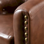 Fauteuil de club contemporain en similicuir PU avec accoudoirs encastrés et garniture cloutée