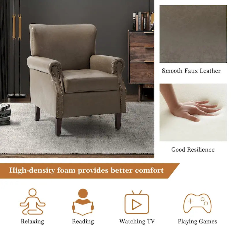 Fauteuil en cuir de transition avec accoudoirs roulés cloutés
